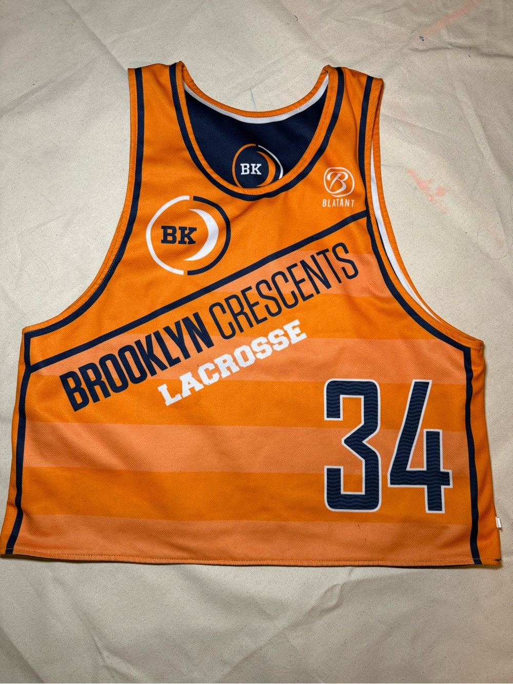 Orange and Navy Reversible cropped lacrosse  Jersey - Number 34
